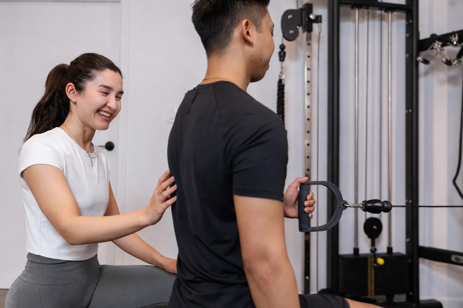A PRE Therapy clinician assessing a patient's movement during a first visit