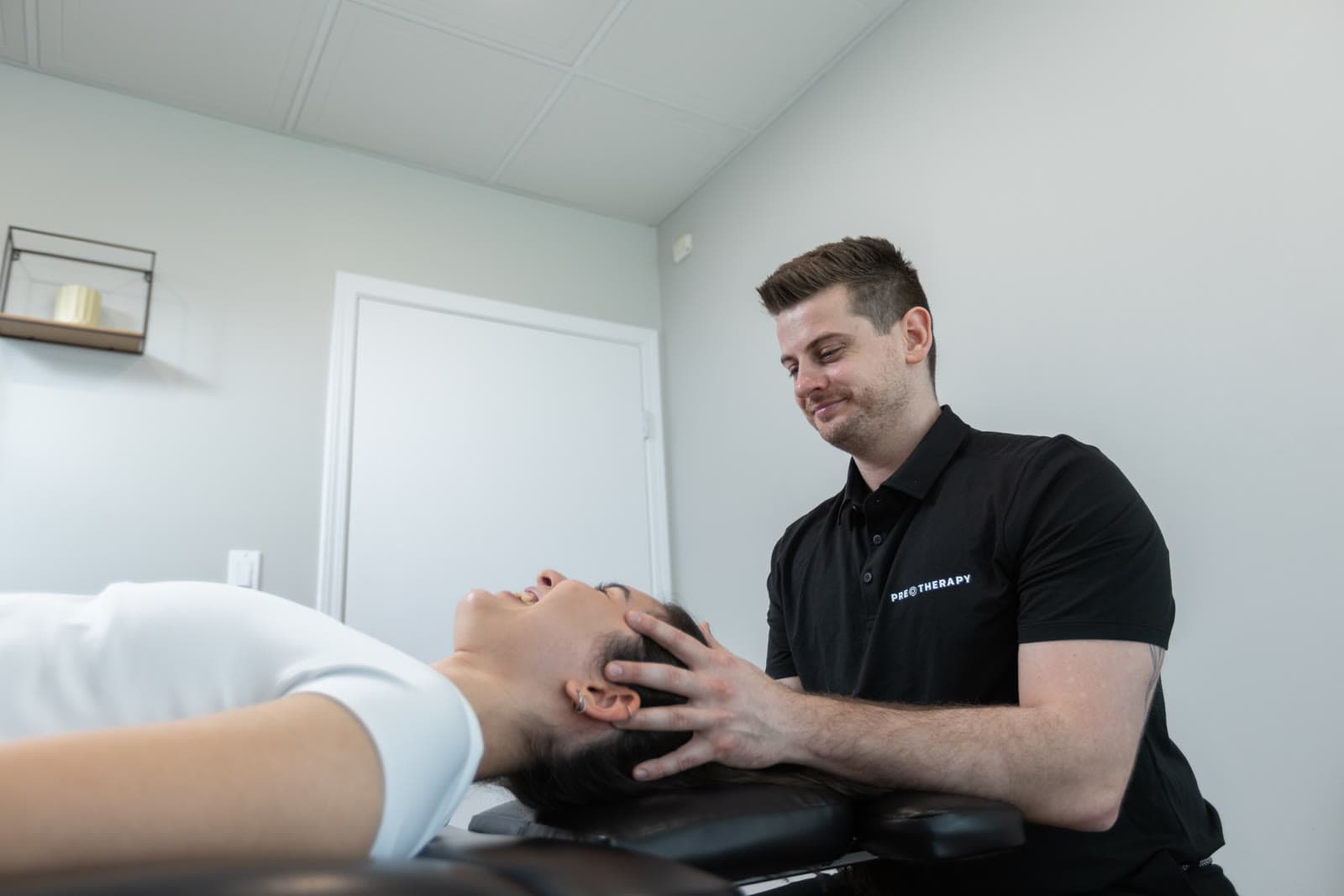 A PRE Therapy practitioner assessing a patient to find the root cause