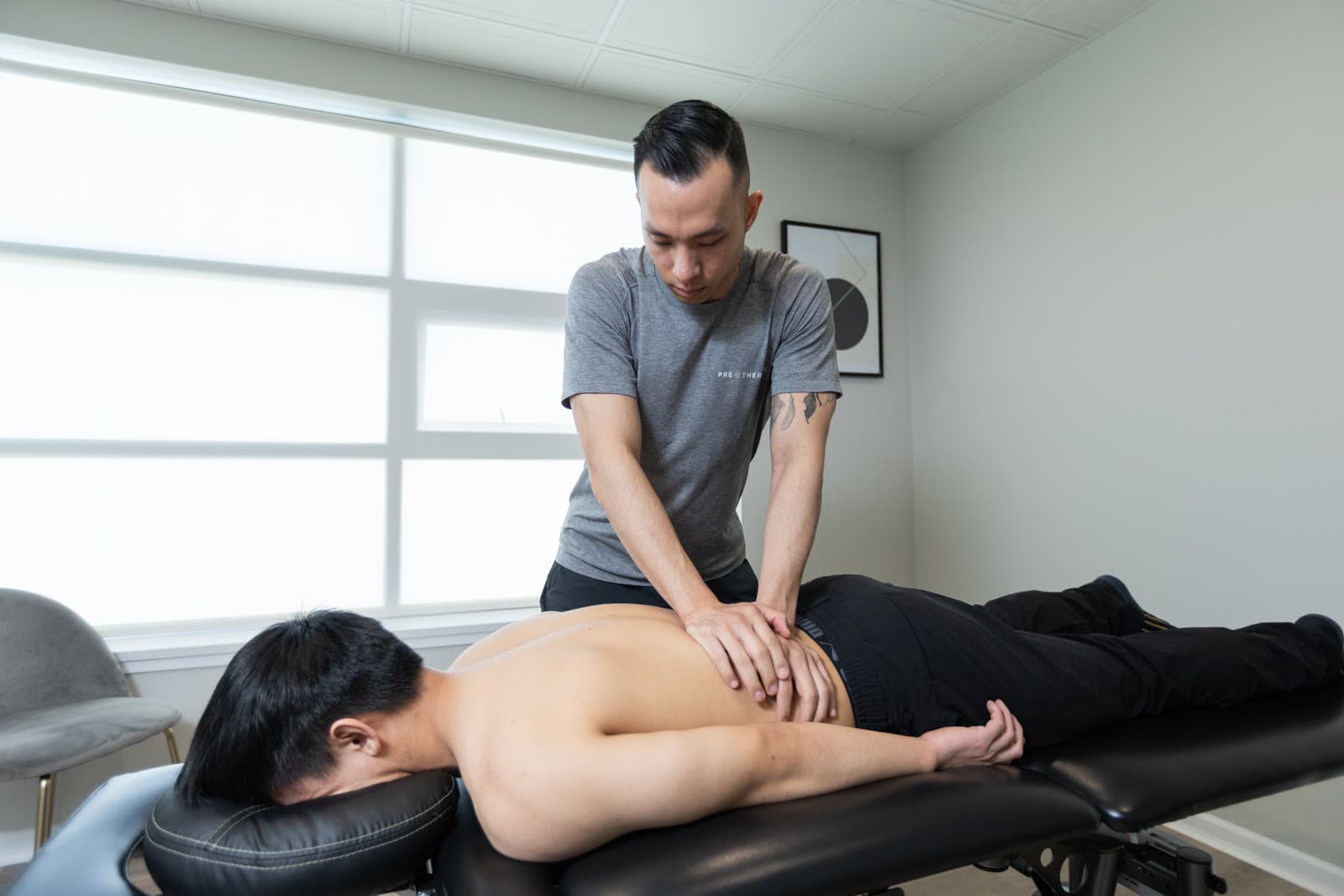 Hands-on treatment restoring movement at PRE Therapy